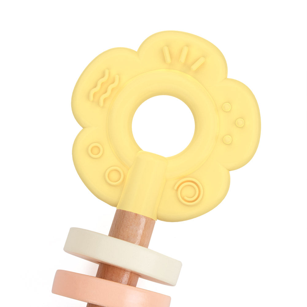 Yellow flower-shaped teething ring with wooden handle. Classic World Flower Grasping baby toy. MOD & TOD