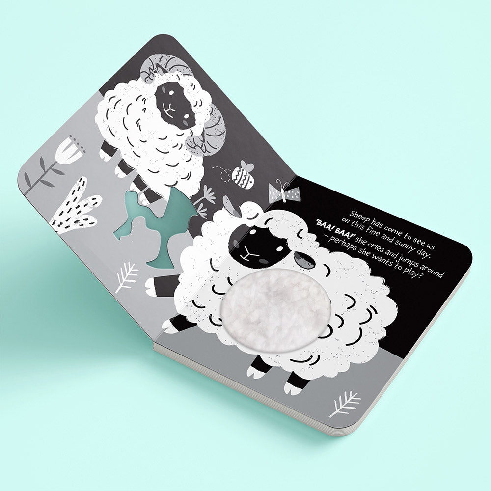 Children's book with illustrations of sheep on a light blue background High Contrast Board Book Touch and Feel: Moo Moo! for baby. MOD & TOD
