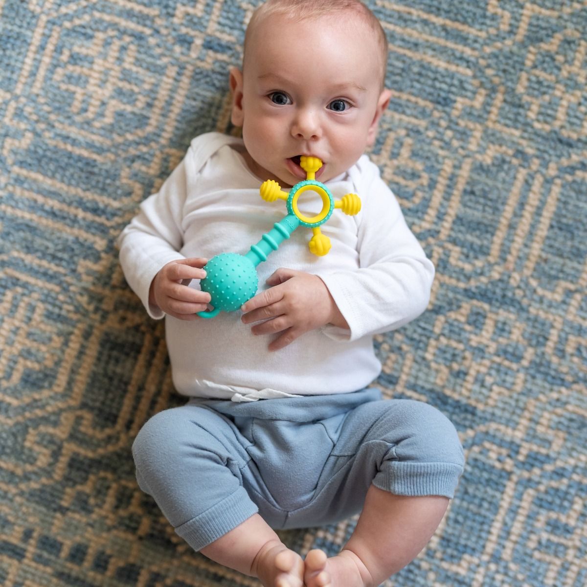 Mobi Gumlii silicone sonsory teether and rattle for teething baby. MOD & TOD