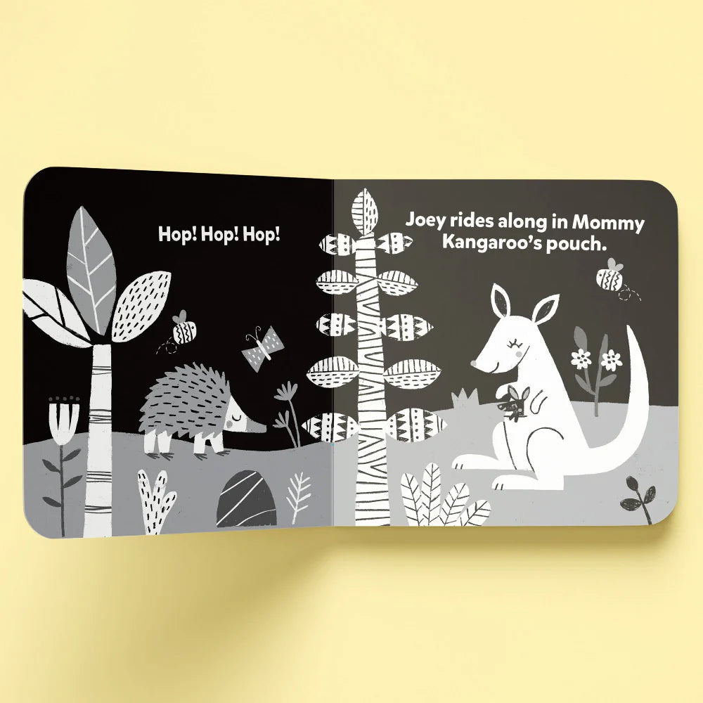 Children's book page with a kangaroo, hedgehog, and trees on a yellow background. Hinkler Baby's First Learning Library (4 Book Set) MOD & TOD