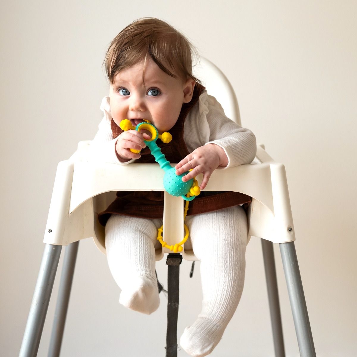Mobi Gumlii silicone sonsory teether and rattle for teething baby. MOD & TOD