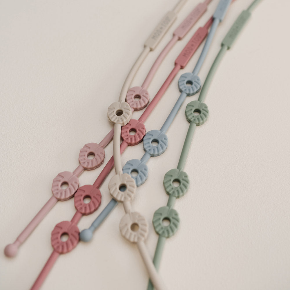 MOD AND TOD Silicone Monstera Strap-It Baby Accessory | Dusty Pink